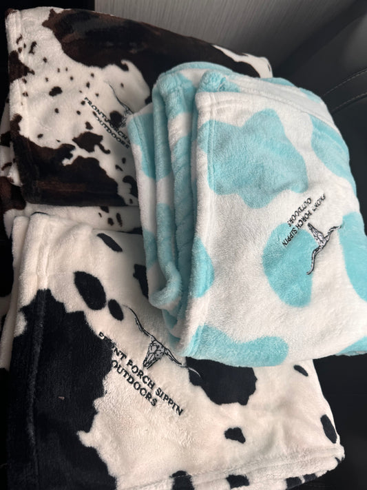Cowhide design blanket with logo embroidered